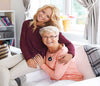 Smart caregiver alert button with automatic fall detection—quick emergency help for seniors, elderly, and independent living.