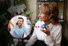 Wearable caregiver alert button with fall detection—send instant emergency help alerts for seniors and elderly care.