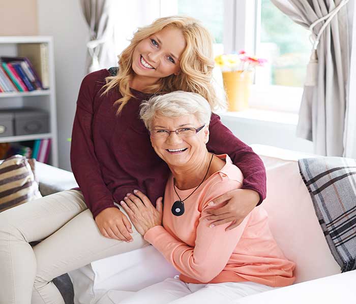 Smart caregiver alert button with automatic fall detection—quick emergency help for seniors, elderly, and independent living.